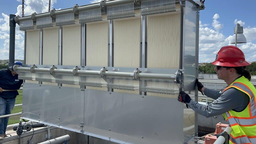 High-capacity water treatment system with filtration panels at MMBR Systems facility.