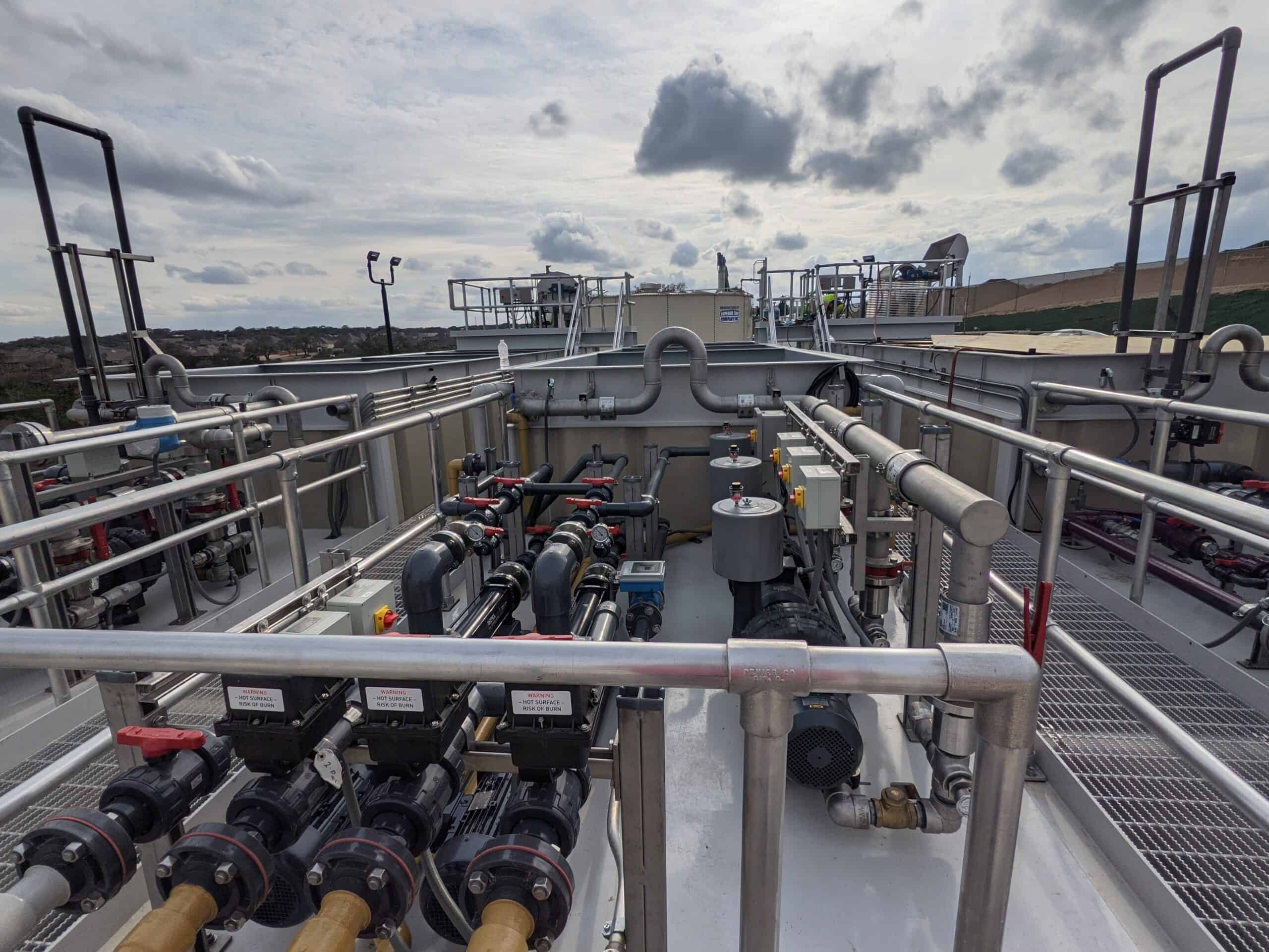 Efficient industrial water treatment system with advanced piping and filtration components.