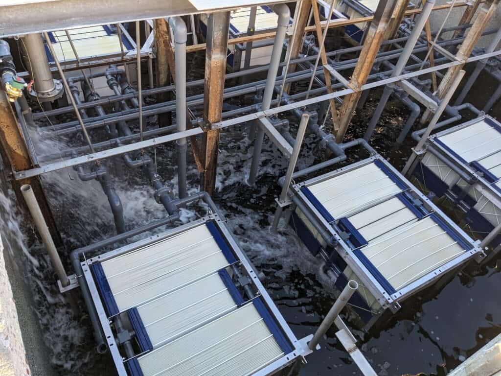 Industrial water treatment system with multiple filtration units at a facility.