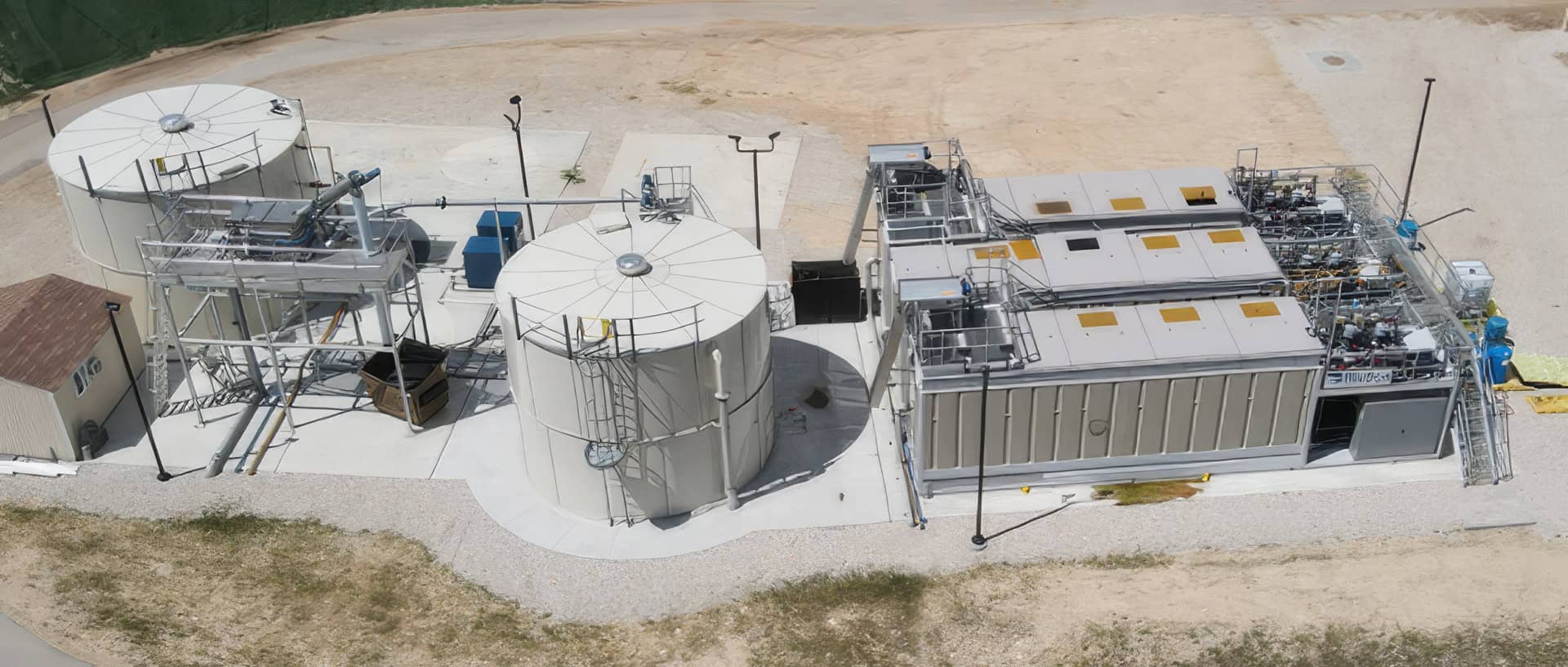 Industrial MBR system for wastewater treatment with tanks and control units.