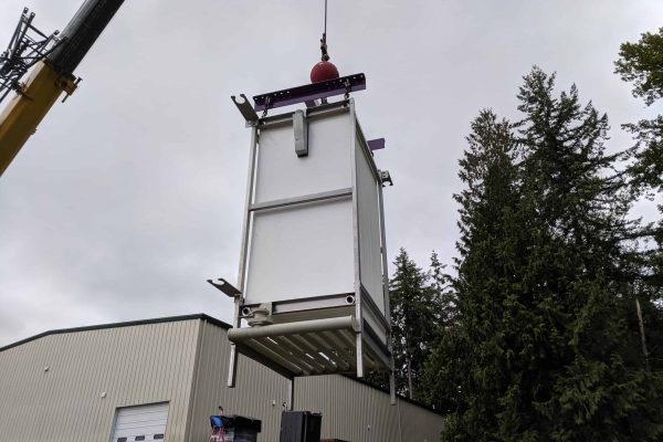 Elevator system installation at MMBR Systems facility for industrial automation.