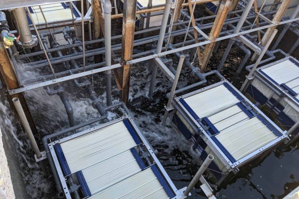 Industrial water treatment system with multiple filtration units at a facility.